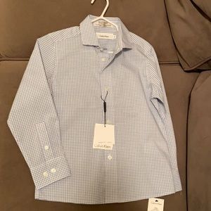 Never worn Calvin Klein button up